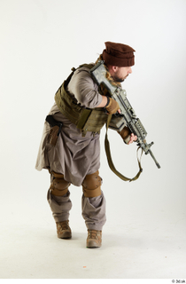 Photos Luis Donovan Army Taliban Gunner Poses crouching standing whole…